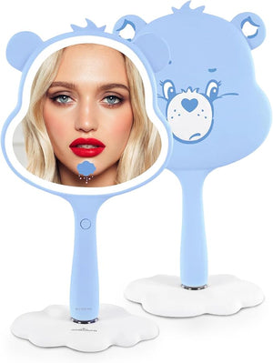 Impressions Vanity Care Bears Grumpy LED Handheld Makeup Mirror for Desk Lighted Travel Makeup Mirror with Detachable Standing Base Ultra Bright Adjustable Lighting and Figural Shaped (Blue)