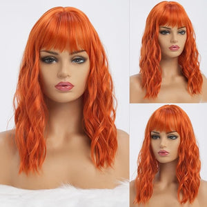 Orange Wigs with Bangs for Women Synthetic 16 inch Medium Length Wigs with Natural Long Wavy Fringe Bang wig Heat Resistant Hair for Daily Party Use(Orange)