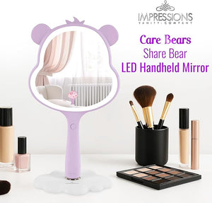 Impressions Vanity Care Bears Share Bear LED Handheld Makeup Mirror for Desk Lighted Travel Makeup Mirror with Detachable Standing Base Ultra Bright Adjustable Lighting and Figural Shaped (Purple)